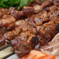 Shish Kebab · Ground/cubed lamb with fresh herbs, onions, mint, cilantro, . green peppers and home ground ...