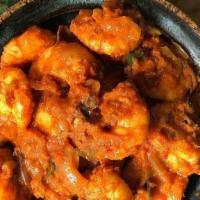 Prawn Tikka Masala · Prawn stir fry with kashmiri deghi mirch, spices, tomatoes, onions . in creamed coconut batter