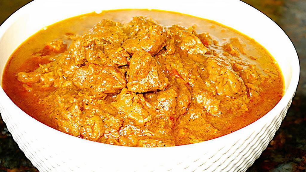 Lamb Curry · Lamb mixed with herbs and spices with tomatoes and onions