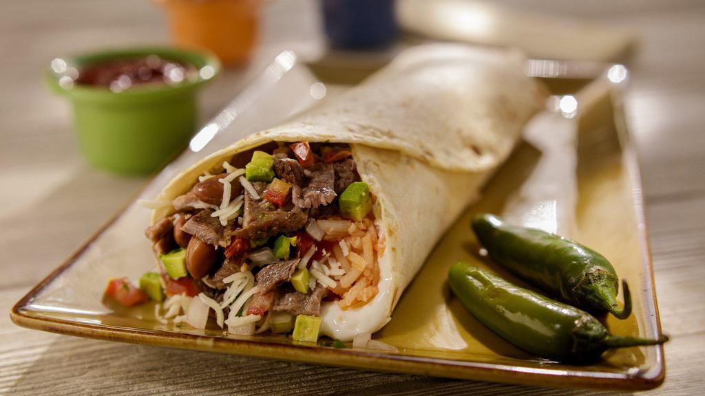 Super Burrito · Choice of meat, beans, rice, pico de gallo, sour cream, cheese, and avocado.