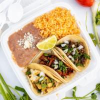 Taco Plate · Three Tacos with Rice & Beans.