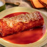 Burrito Mojado · Choice of meat. Super Burrito topped with Enchilada Sauce and Melted Cheese.