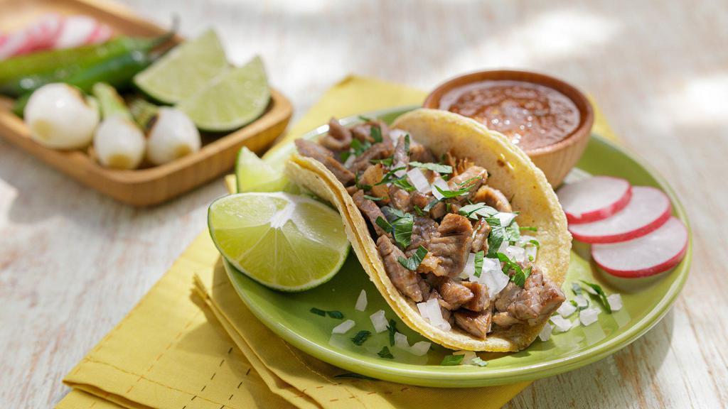 Taco · Choice of meat, onion & cilantro
