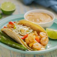 Taco Del Mar · Fish or Shrimp, Grilled Onions, Bell Peppers, Cabbage, Pico de Gallo & Chipotle Sauce