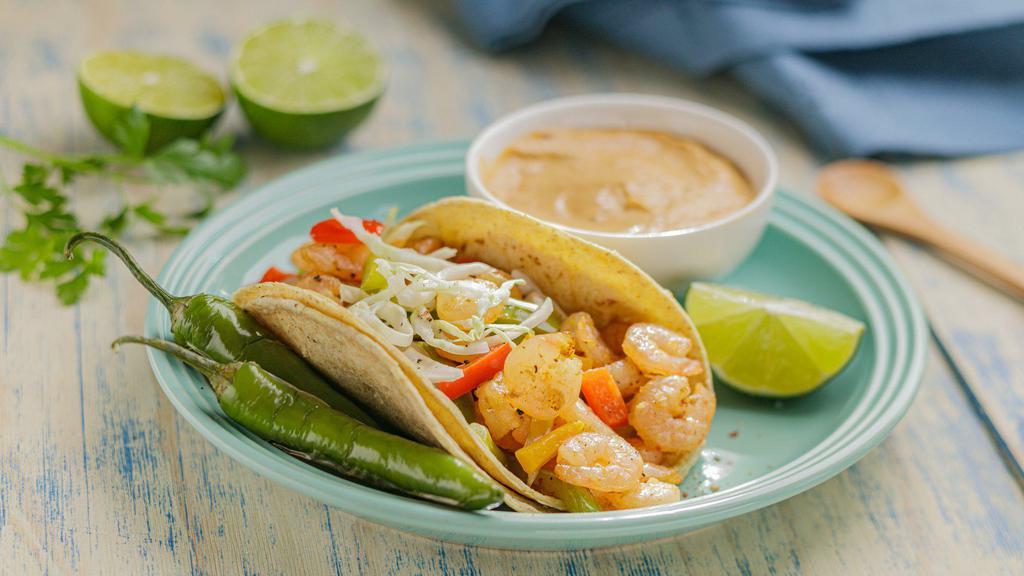 Taco Del Mar · Fish or Shrimp, Grilled Onions, Bell Peppers, Cabbage, Pico de Gallo & Chipotle Sauce
