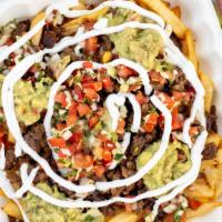 Carne Asada Fries · French fries, topped with choice of meat, guacamole, cheese, onions, cilantro, and chipotle ...