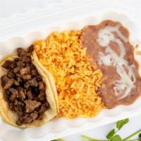 Kid's Taco Plate · Served with rice and beans.