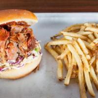 Pulled Pork Sammy · Slow smoked, 12-hour pulled pork, topped with housemade slaw and a dab of our special honey ...