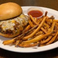 Chili Cheese Burger · 1/2lb Angus beef patty, topped with our home made chili and shredded cheese, served on a pot...