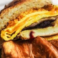 Breakfast Sandwich (Serves 1) · 2 Eggs w/ Cheese on Focaccia, Toast, Croissant or Bagel.
