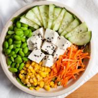 Vegetarian · Tofu, cucumber, edamame, carrot, corn, roasted black sesame seeds with citrus ponzu sauce.
