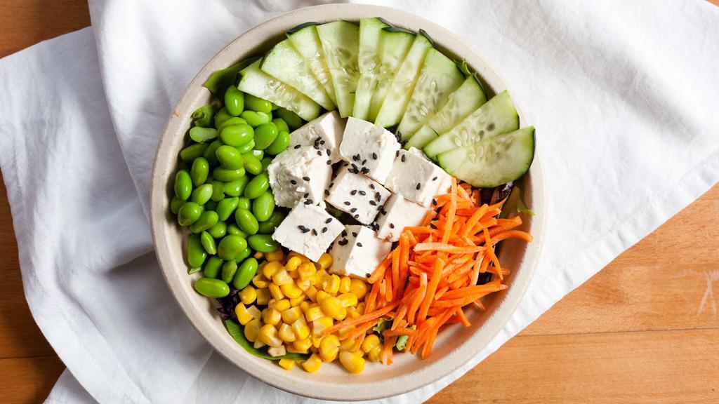 Vegetarian · Tofu, cucumber, edamame, carrot, corn, roasted black sesame seeds with citrus ponzu sauce.