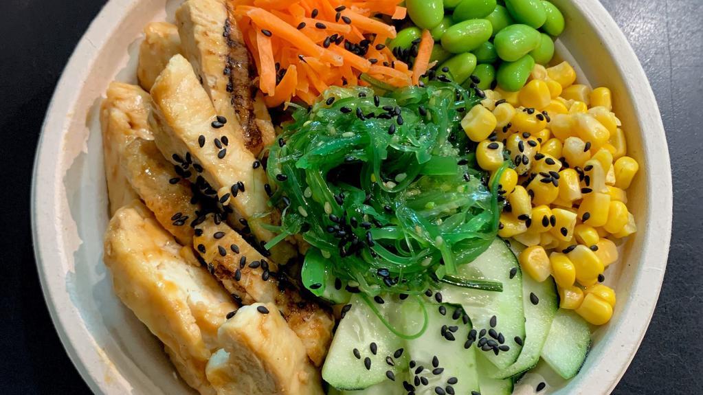 Teriyaki Chicken · Teriyaki Chicken, carrots, corn, cucumber, edamame, seaweed salad, roasted black sesame seed with teriyaki sauce.