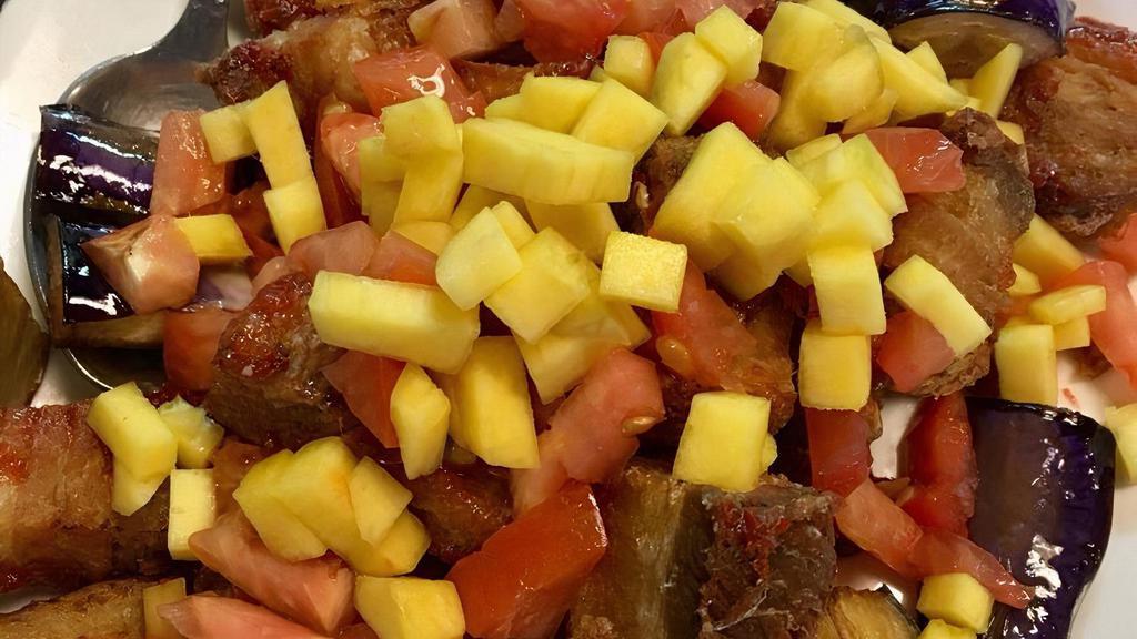 Crispy Binagoongan · Lechon Kawali tossed in shrimp paste with eggplant, tomato and mango