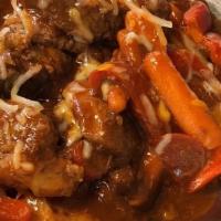Beef Caldereta · Spicy stew with beef chunks braised in rich tomato sauce, cheese, and liverwurst garnished w...