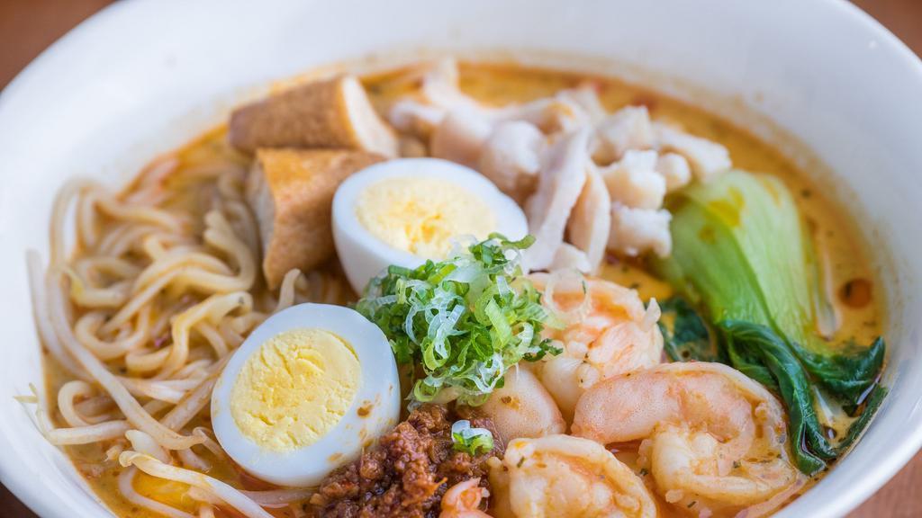 Curry Laksa with Ramen Noodles · with shrimp, fried tofu, egg, shredded chicken, bean sprouts and bok-choy. A balance of sweet, sour, salty and spicy coconut broth