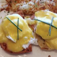 Original Benedict · Poached eggs, smoked Ham topped with hollandaise sauce.