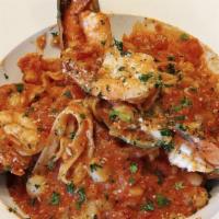 Fettuccine di Mare · Mussels, shrimp, tilapia and scallops sautéed with marinara sauce