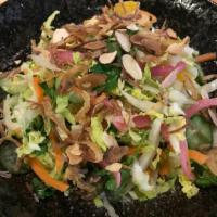 Tofu-Cabbage Salad · Hodo Soy tofu, napa cabbage, cucumber, oranges, almonds, pickled onions, scallions, sesame v...