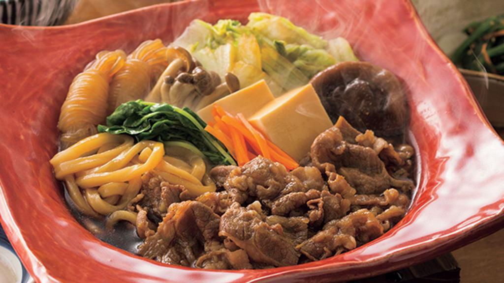 956. Sukiyaki · Beef hot pot comes with assorted vegetables, rice and miso soup.