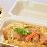 948. Chicken Katsu Toji Ju · Chicken cutlet (thigh meat) simmered in sauce and eggs over rice. Miso soup.