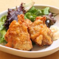 932. Chicken Karaage Petite 2pc · Japanese Crispy fried chicken and Salad mix.