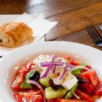 Greca · The  Greek peasant salad made with  authentic Feta, tomatoes, peppers, cucumber Kalamata oli...