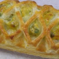 Leek and Parmezan Croisant · This delicate and flaky croissant is filled with a flavorful leek and Parmesan combination ....