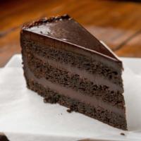 Chocolate  Fondant Cake · Chocolate layer cake filled with chocolate cream covered with chocolate ganache and trimmed ...