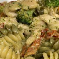 Fusilli Al Pollo* · Rotini pasta with Chicken, broccoli, sundried tomatoes, pesto and cream (pesto sauce contain...