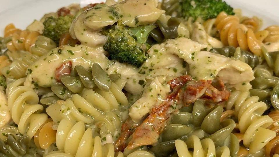 Fusilli Al Pollo* · Rotini pasta with Chicken, broccoli, sundried tomatoes, pesto and cream (pesto sauce contains walnuts).