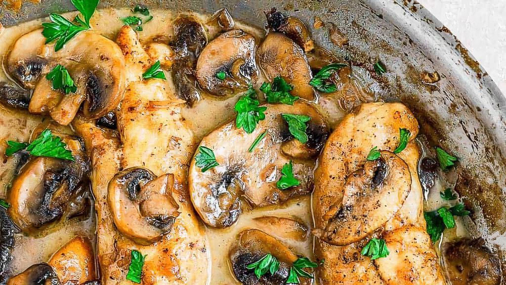 Chicken Marsala · Chicken Breast Scaloppini with Mushroom Marsala , served with Roasted Potatoes and Vegetable.