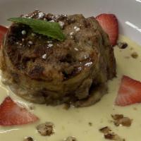 Bread Pudding · classic bread pudding, served with english cream and wallnuts
