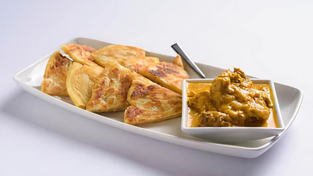 Appetizer Palata · Multi-layer bread served with Coconut Chicken. (Sub Vegetarian Curry $2, Sub Lamb Curry $3)