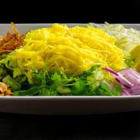 Mango Salad · Shredded pickled mangoes served with fried onions, fried garlic, cabbage, red onions, yellow...