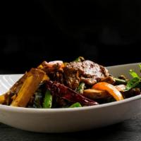 Fiery Beef Tofu · Choice Harris ranch beef wok fried with tofu, string beans, bell peppers and basil in a swee...