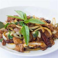 Basil Chili Chicken · Chicken breast tossed with dried chili flakes, spices, jalapeños, and onions; finished with ...