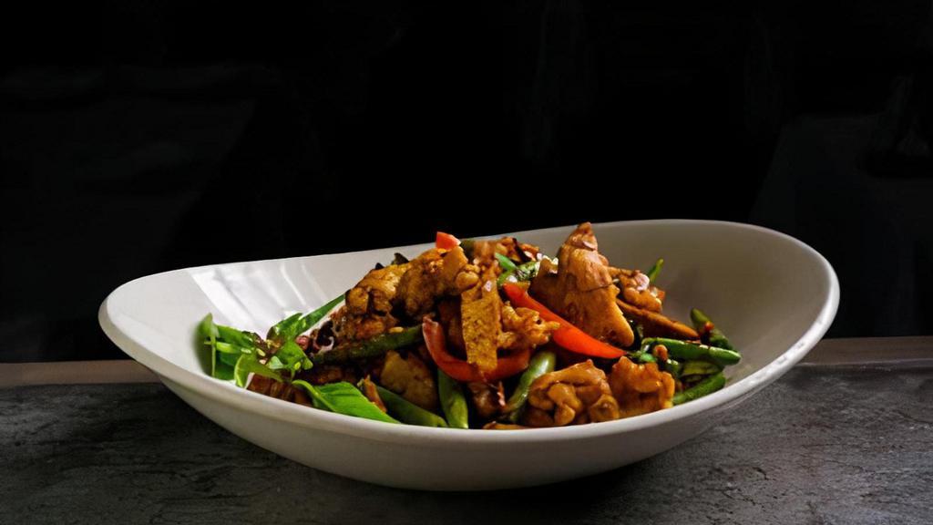 Fiery Chicken Tofu · Chicken breast wok fried with tofu, string beans, bell peppers and basil in a sweet and spicy sauce.