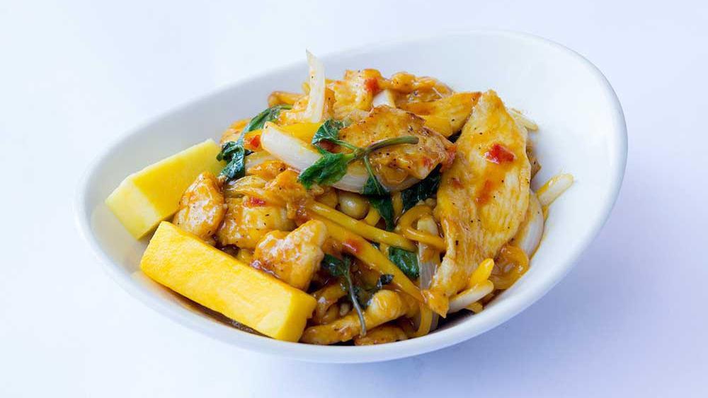 Mango Chicken · Chicken breast tossed in wok with basil, onions, mango and mango puree. Served with fresh mango on the side.