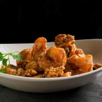 (C) Walnut Shrimp · Lightly fried shrimp wok tossed with creamy sweet sauce, topped with toasted walnuts and ses...