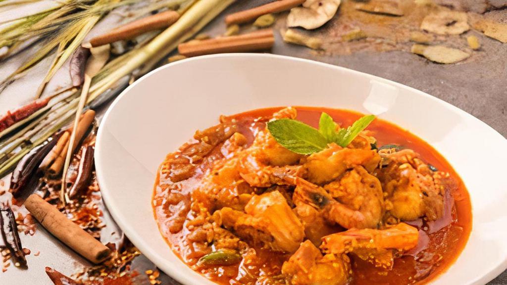 Shrimp Curry · Succulent shrimp cooked in Rangoon Ruby's special homemade red curry sauce.