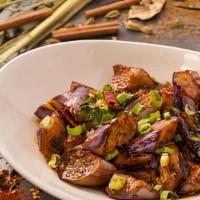 Eggplant & Garlic · Fried eggplant with garlic and scallions in a sweet chili sauce.