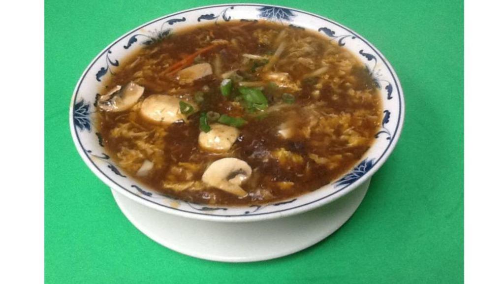 Vegetable Hot & Sour Soup · Hot and sour soup served with tofu, mushrooms, bamboo shoots, onions and carrots. Contains egg.
