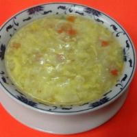 Egg Flower Soup · Egg flower with green peas and carrots. Served with chicken broth.