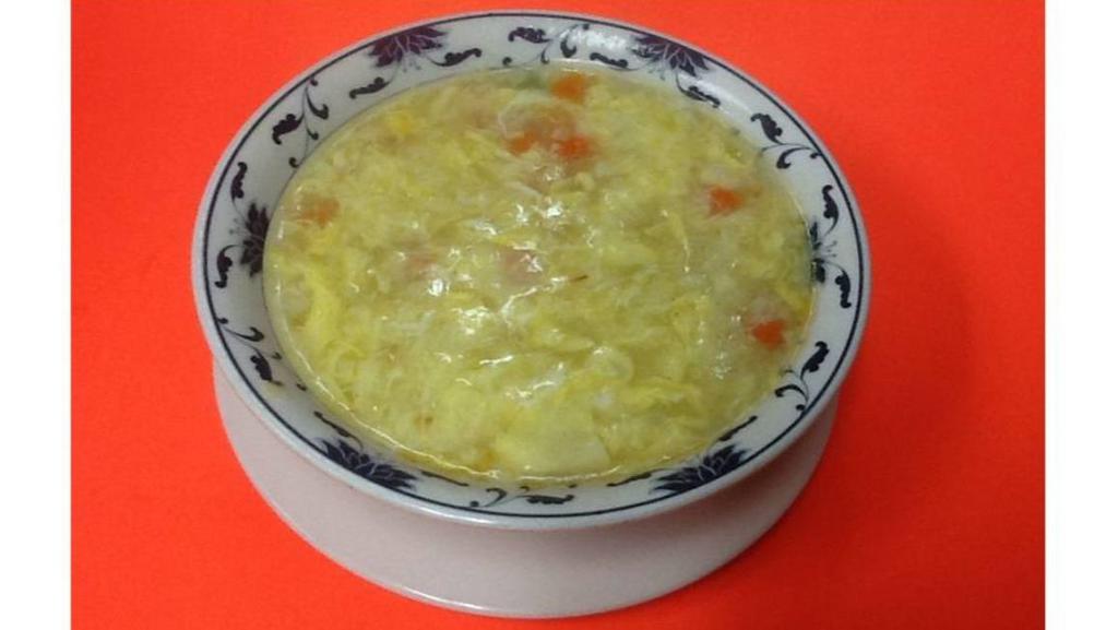 Egg Flower Soup · Egg flower with green peas and carrots. Served with chicken broth.