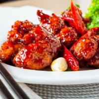 General's Chicken · Hot & spicy. Our chef's specialty. Deep-fried chicken served with zesty garlic sauce, chilis...