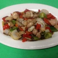 Chicken in Black Bean Sauce · Diced chicken sauteed with bell peppers, and onion in a rich black bean sauce.
