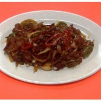 Lamb with Cumin · Hot and spicy. Lamb sauteed with fresh chilies, white onions in a cumin sauce.