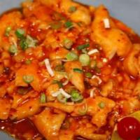 Szechuan Style Fish Fillet · Slightly spicy. Fish fillet sauteed with garlic, ginger and onions in a family-style chili s...