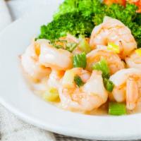 Lover's Prawns · Half spicy. On one half . Shrimps glazed with a tomato sauce. on the other, shrimps covered ...